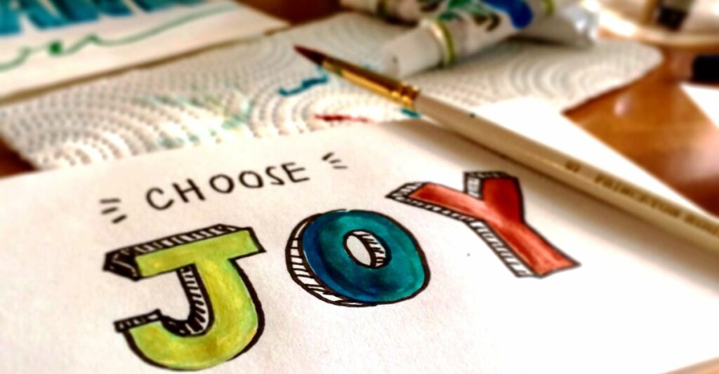 Watercolor lettering "choose joy"